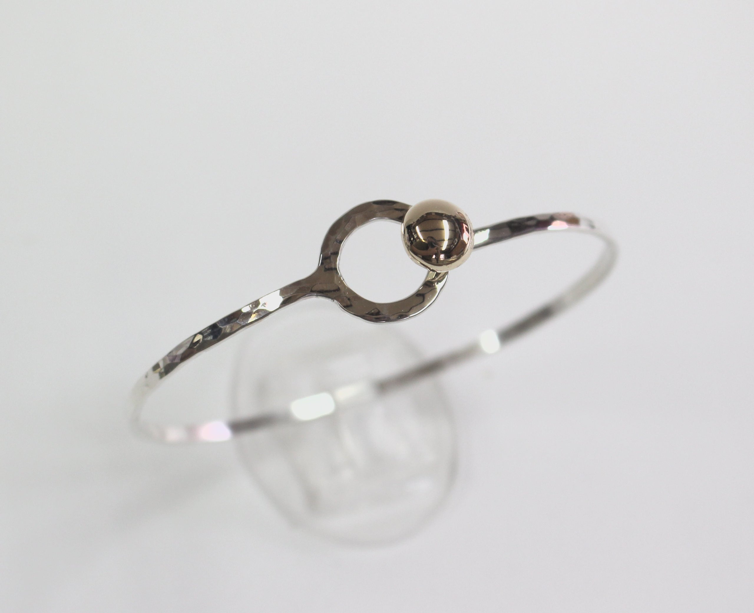 Little silver shop hot sale button bracelet