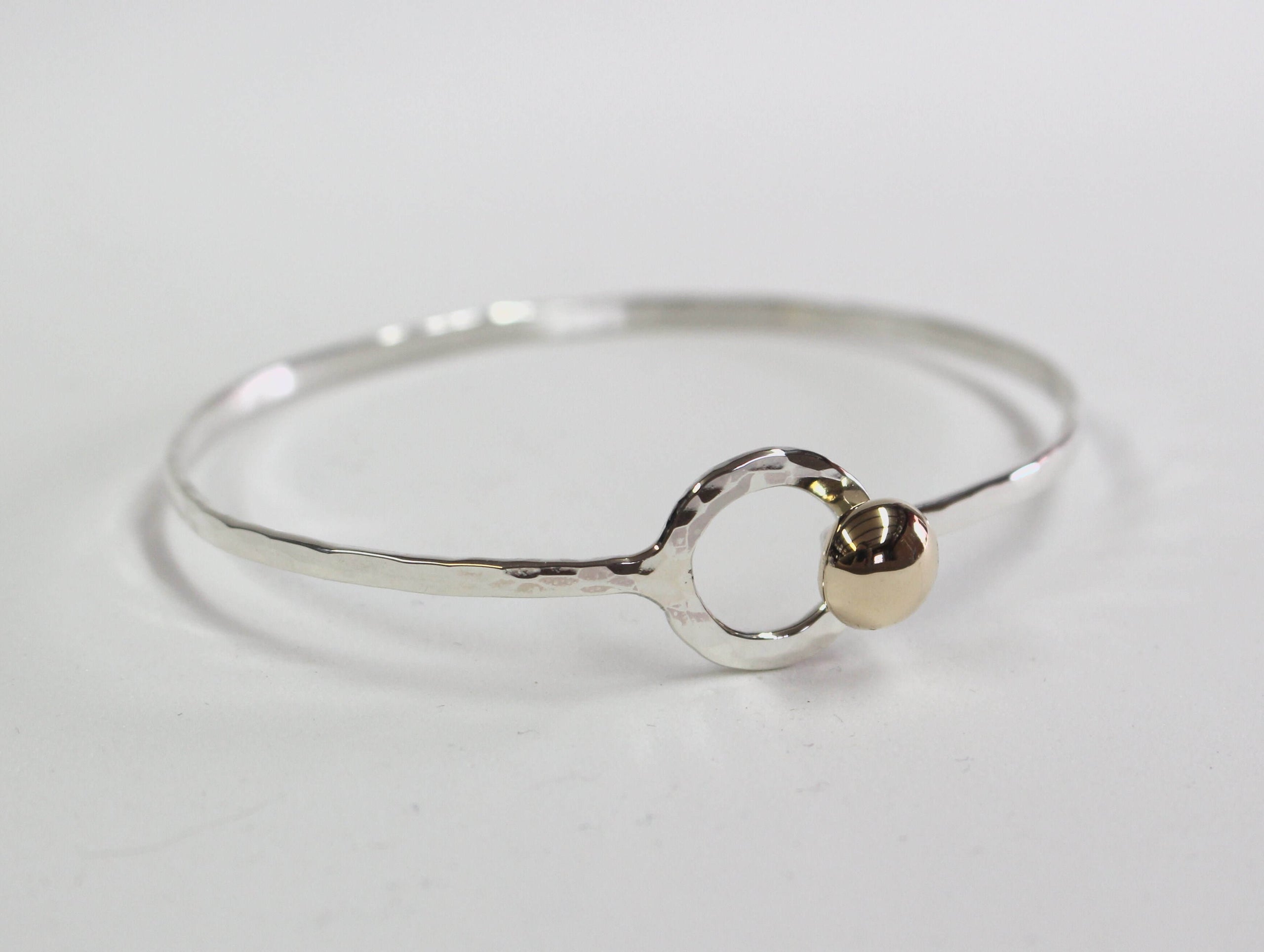 Little silver shop hot sale button bracelet